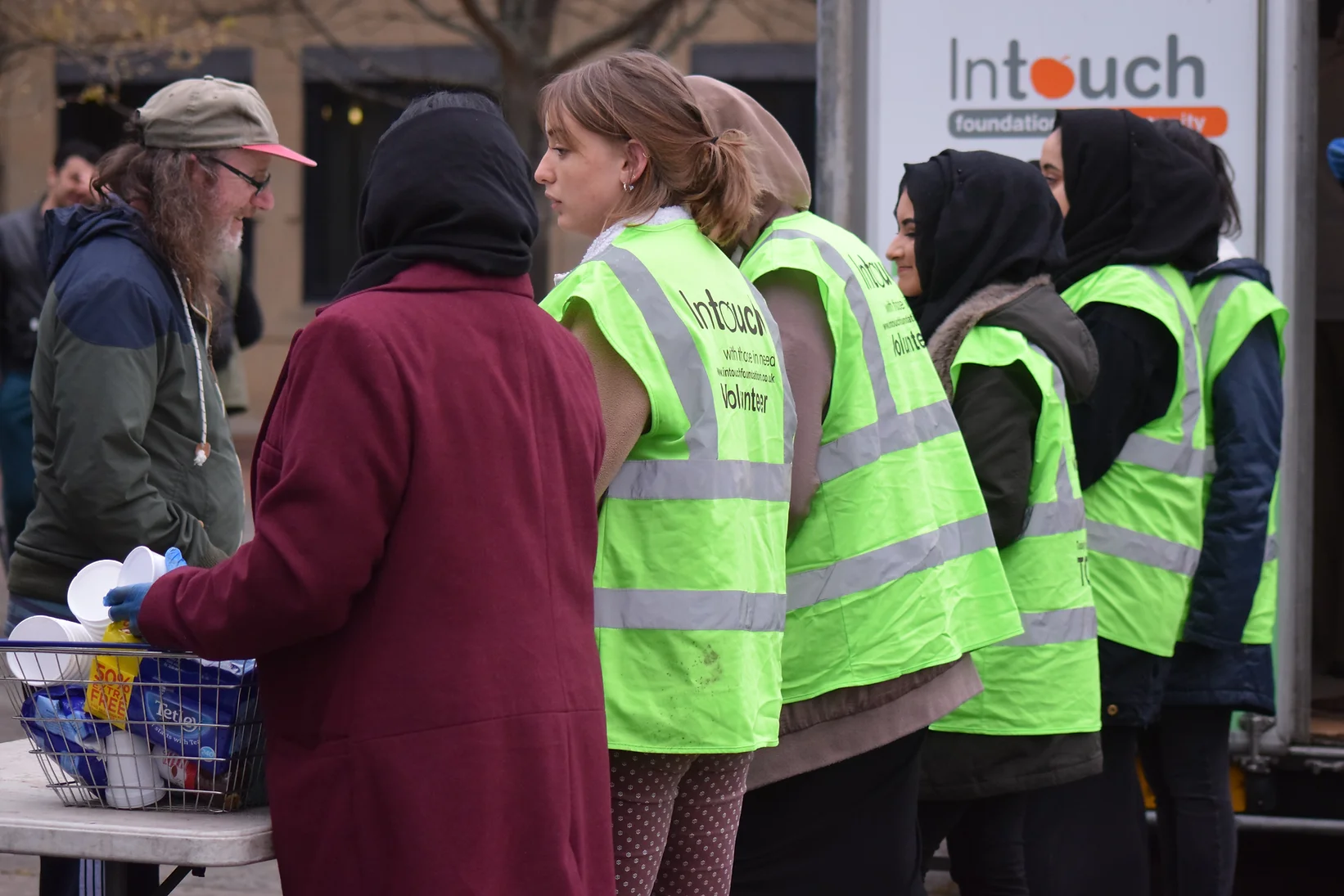 Volunteers hard at work handing out hot drinks